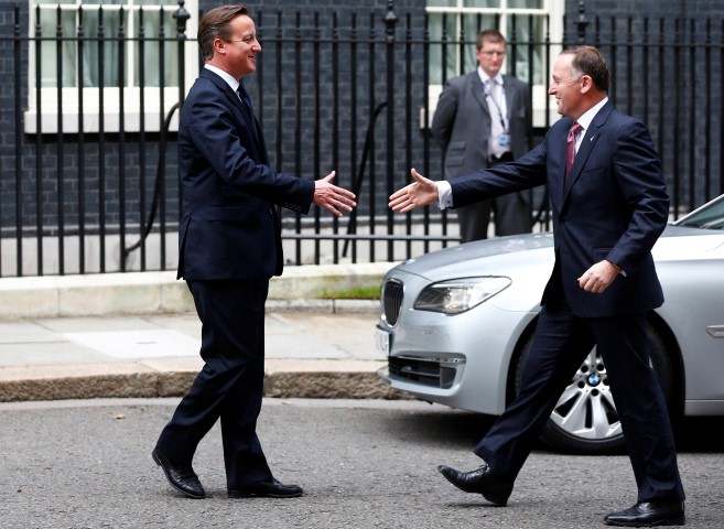 Britain's Prime Minister, David Cameron (L), greets the Prime Minister of New Zealand, John Key, outside 10 Downing Street in central London September 18, 2013. REUTERS/Andrew Winning (BRITAIN - Tags: POLITICS)